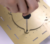 Attaching the motor to the bottom plate